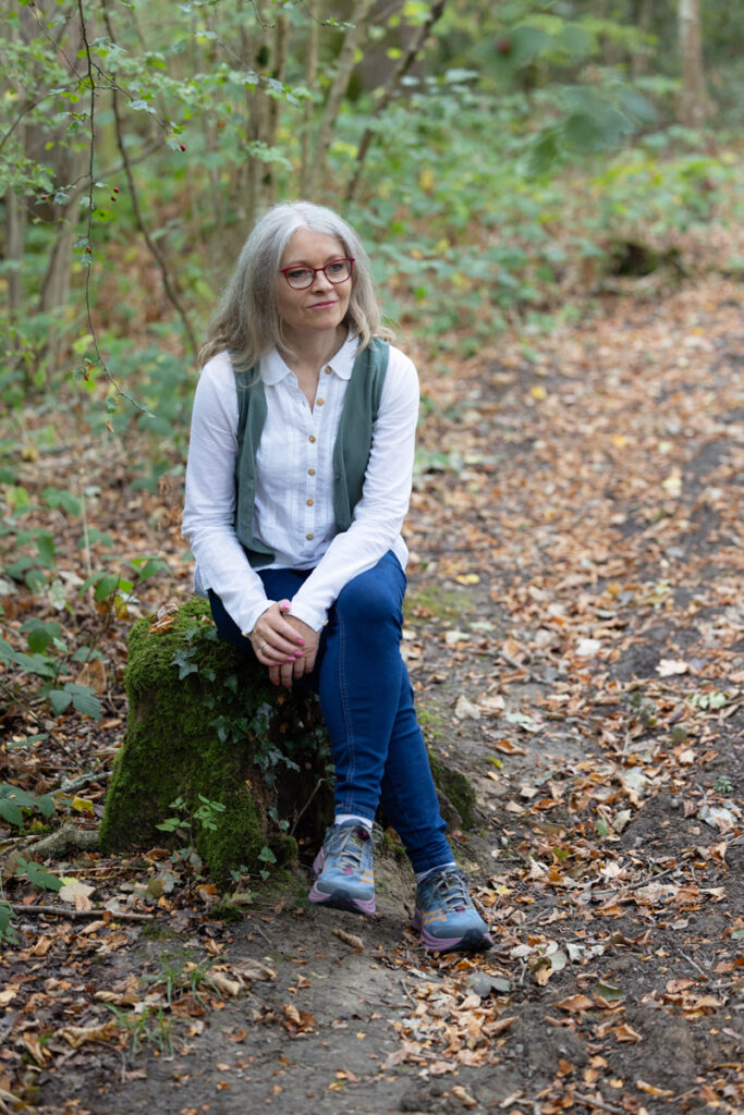 Catherine listening in woods